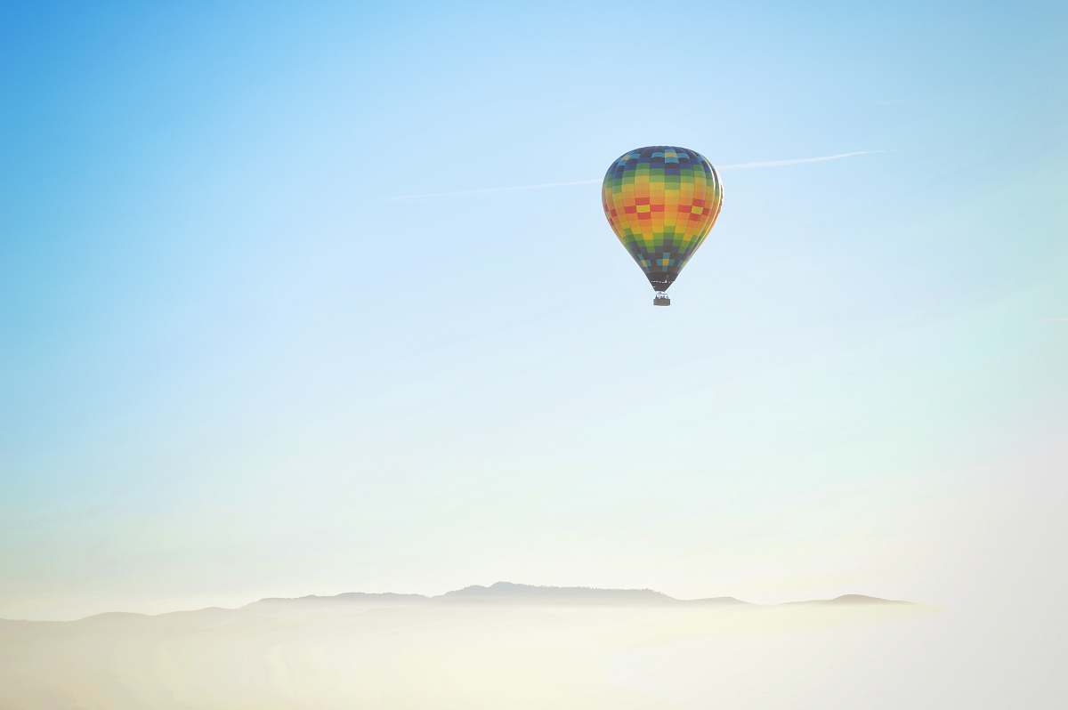 balloon blue, yellow, and red hot air balloon napa valley